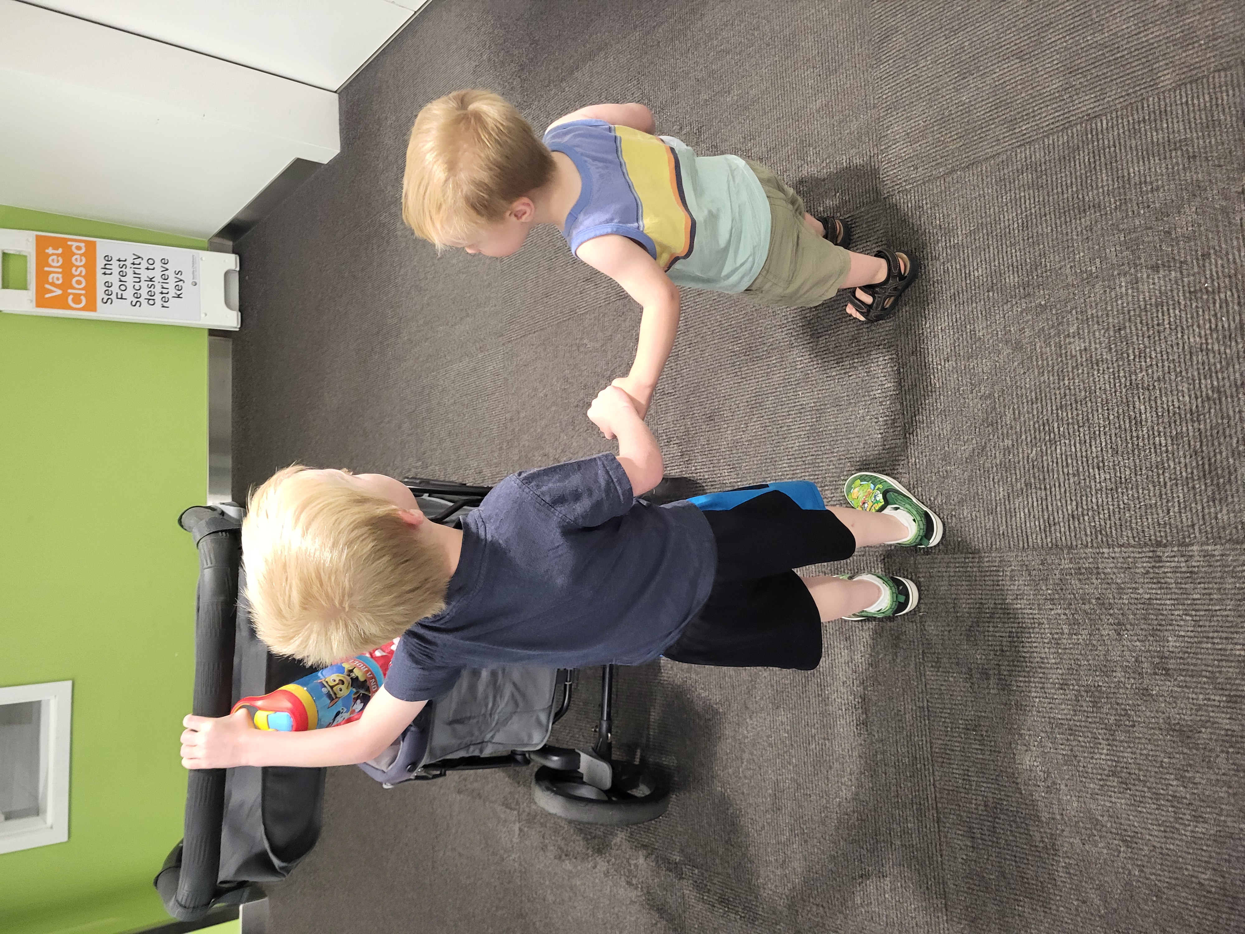 Elias walking Micaiah in for treatment